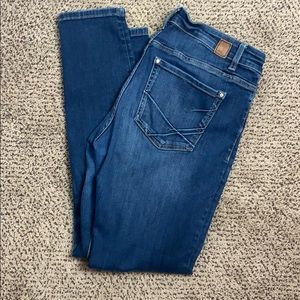 Buckle Skinny Jeans